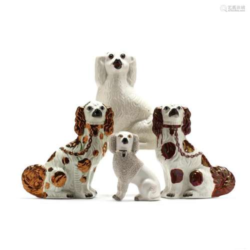 Four Antique Staffordshire Spaniels