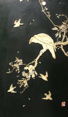 Japanese carved bone on wood panel.