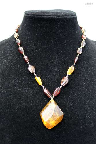 Natural amber necklace with big natural amber pendant.