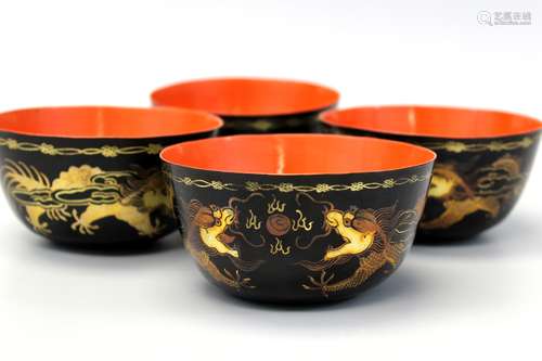 Four Chinese lacquer bowls.