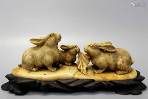 Chinese soapstone carving of rabbits.