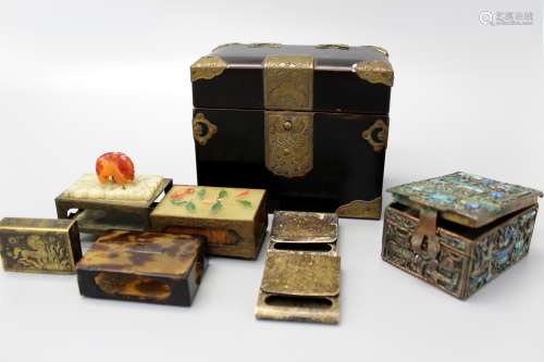 Group Chinese jewelry boxes and match boxes.
