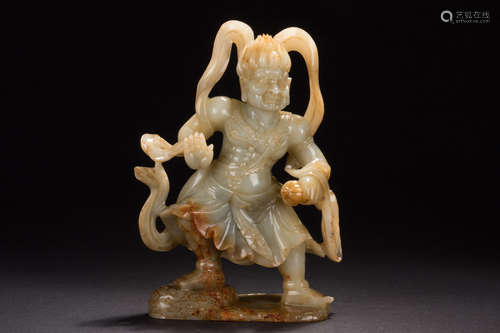 CELADON JADE CARVED WRATHFUL DEITY