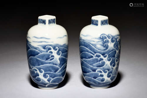 PAIR OF BLUE AND WHITE SMALL BOTTLE VASES