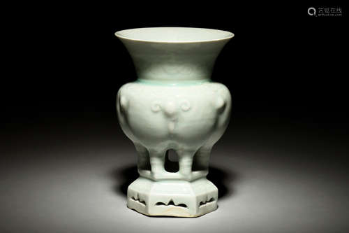 CELADON GLAZED AND IMPRESSED 'RAMS' BOTTLE VASE