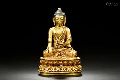 GILT BRONZE SEATED SHAKYAMUNI FIGURE