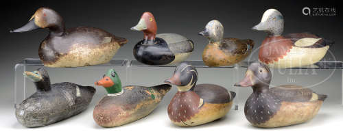 GOOD GROUP OF EIGHT ASSORTED AMERICAN DECOYS INCLUDING A RARE PAIR OF OSCAR PETERSON DECOYS.
