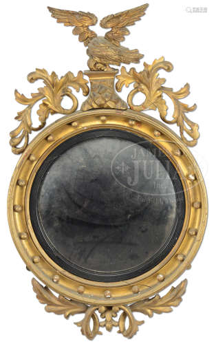 FEDERAL CARVED AND GILT CONVEX MIRROR.
