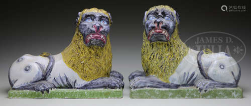 PAIR OF LUNEVILLE FAIENCE RECUMBENT LIONS.