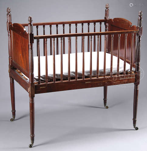 PERIOD SHERATON TURN LEGGED CRIB WITH FLUTED POSTS AND PINEAPPLE FINALS, PURCHASED FROM JOHN S. WALTON.