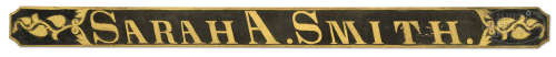 OUTSTANDING CARVED WOOD AND GILT NAME PLAQUE FOR THE SCHOONER “SARA A. SMITH”.