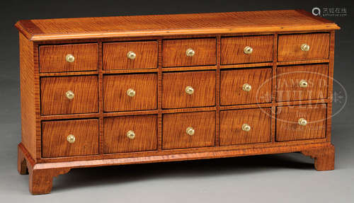 DIMINUTIVE TIGER MAPLE APOTHECARY CHEST.