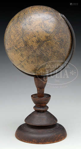 SMALL TERRESTRIAL GLOBE ON TURNED STAND.