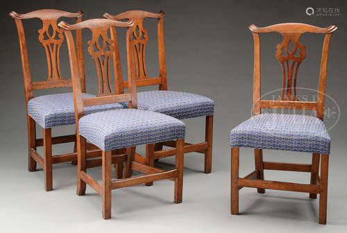 SET OF FOUR CHIPPENDALE CHERRY SIDE CHAIRS.