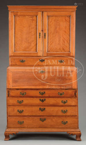 NEW ENGLAND CHIPPENDALE CHERRY AND FIGURED BIRCH SECRETARY BOOKCASE.