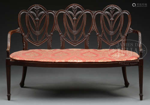 CARVED MAHOGANY 3-SHIELD BACK SETTEE.