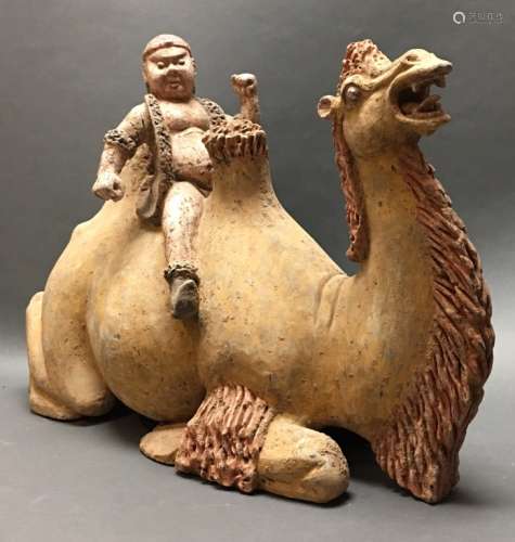 Chinese pottery reclining camel w/ rider