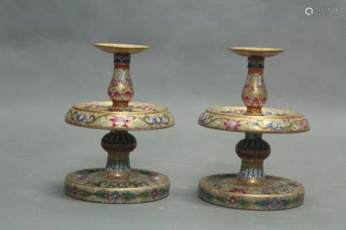 A PAIR OF FAMILLE ROSE CANDLE HOLDERS
