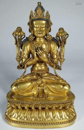 A GILT-BRONZE GUANYIN