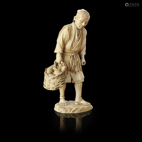 Y CARVED IVORY OKIMONO OF A FISHERMAN