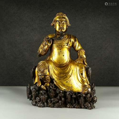 A Large Gilt Bronze Figure Of Buddha With Base