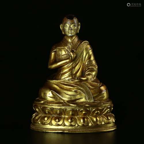 A Gilt Bronze Figure Of Buddha