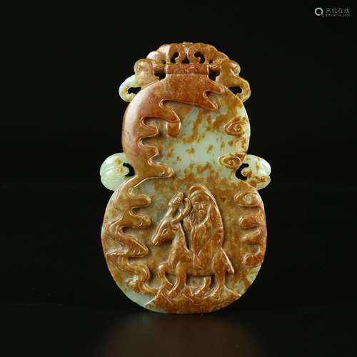 A Carved Jade Pendant