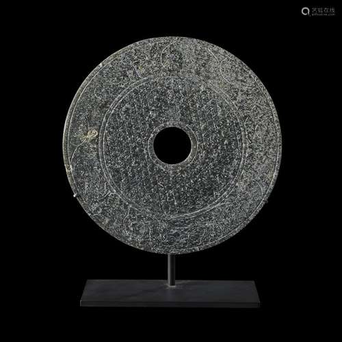 A Chinese carved grey stone Bi disk in Han Dynasty/Warring States style,