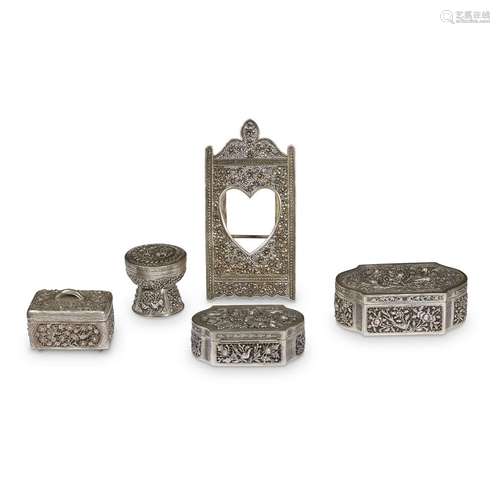 Group of four Chinese pierced and repousse silver boxes and one picture frame (5),