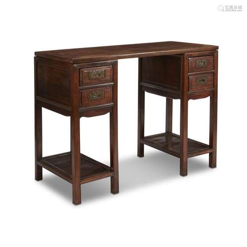 A Chinese hardwood desk on pedestal stands,