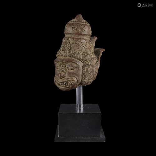 An Indonesian red pottery head of Hanuman,