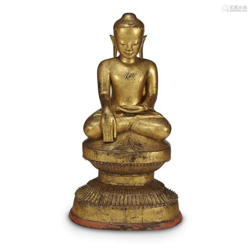 A Burmese gilt-lacquered wood figure of the Buddha seated, In 17th/18th century style, possibly later