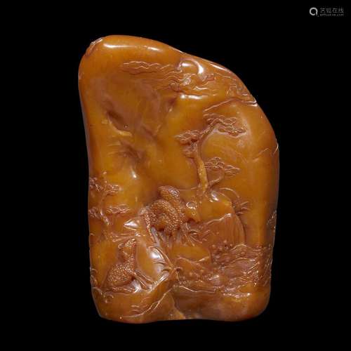 A Chinese carved amber soapstone mountain, Qing dynasty