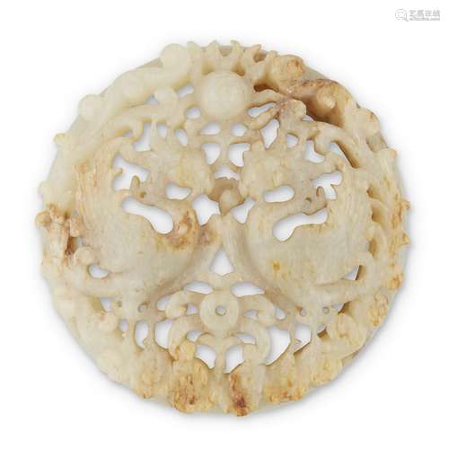 A Chinese pierced and carved white and russet jade Double Phoenix roundel,