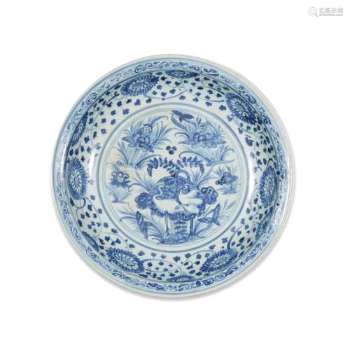 A Chinese provincial blue and white porcelain large dish, ming dynasty, possibly 15th/16th century