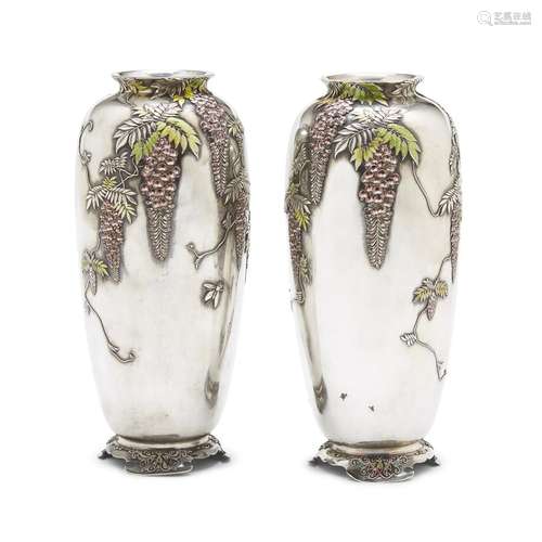 A pair of finely-decorated Japanese enameled silver Wisteria vases, Sanju Saku,