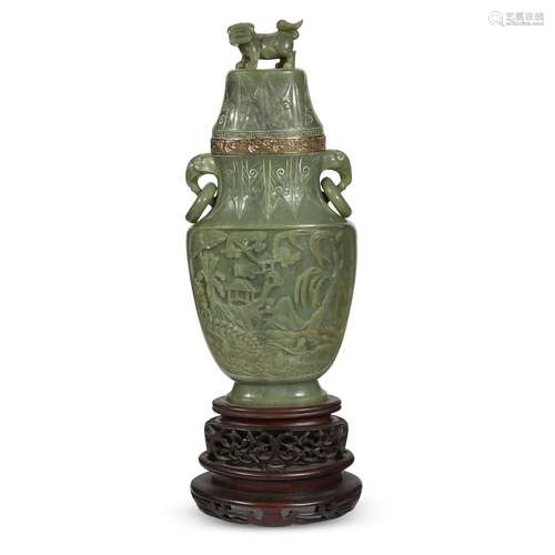 A Chinese carved celadon jade vase and cover, now mounted as a lamp,