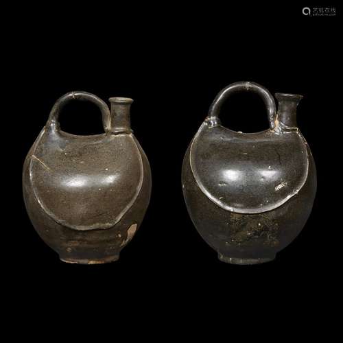 A pair of Chinese black-glazed flask-form ewers, Liao dynasty or later