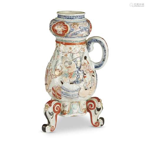 A Japanese molded porcelain coffee urn, Arita, decorated in an Imari palette, Late 17th/early 18th century