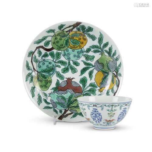 A Chinese porcelain incised and enameled Sanduo dragon dish, Kangxi six-character mark, and a doucai bowl, Yongzheng mark,