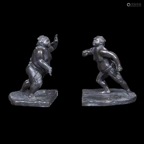 A pair of Japanese patinated bronze sumo wrestler bookends,