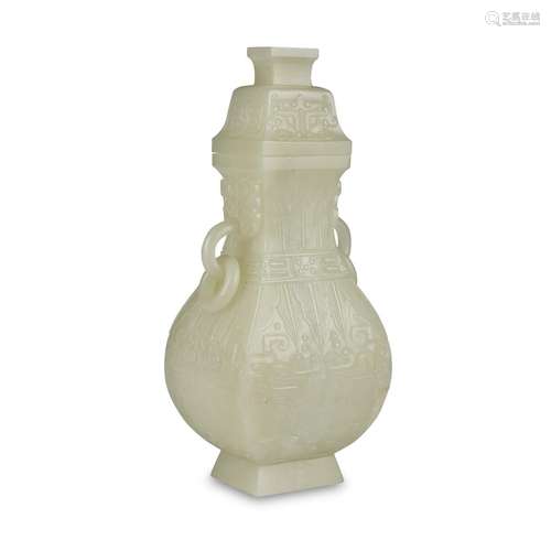 A Chinese pale celadon jade archaistic vase and cover, Hu,