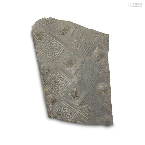 A Chinese stamped grey pottery tile fragment, han dynasty