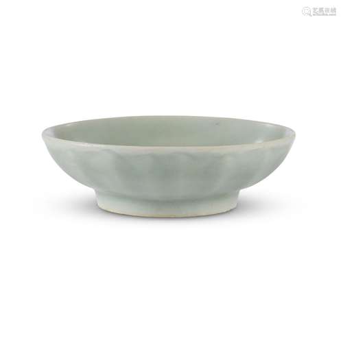 A Chinese Longquan celadon lotus small circular dish, southern song dynasty