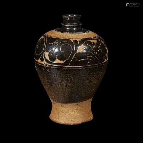 A Chinese Cizhou style carved meiping with black scrolling foliage at the shoulder,