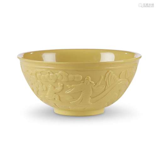 A Chinese carved yellow glass bowl, qianlong four-character mark and probably of the period