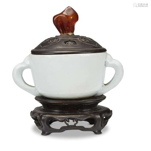 A Korean porcelain twin-handled cup, with carved wood cover, amber finial,, The cup 18th/19th century