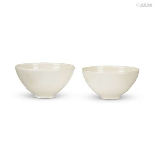 Two similar Chinese Ding-type ceramic small hemispherical bowls,