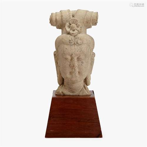 A Chinese carved sandstone head of a bodhisattva,