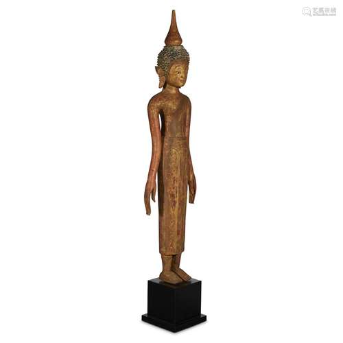 A Laotian carved and gilt wood figure of a standing Buddha, 18th/19th century or later